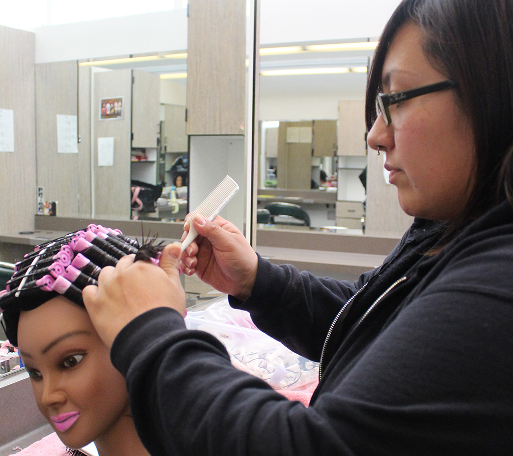 Cosmetology prepare Centennial-themed hair show