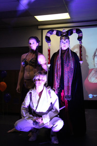 The “Star Wars” trio made up of Shella Walker as prisoner Princess Lea(left),  Kristen Clausen as Luke Skywalker(center)  and Rachael Near as Queen Amidala of Naboo(right). The trio styled each others hair and make up for the Halloween Hair Show.