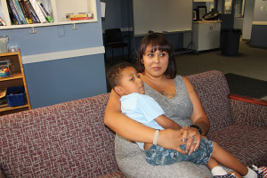Astrid Perez Clarion Elizabeth Saucedo pictured with her son Gabriel play in the Veterans Center. 