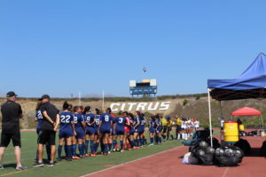 The Owls line up to begin their first game at Citrus Stadium, playing San Diego Mesa College. 