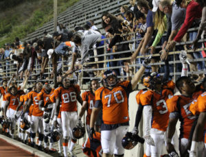 The Citrus Owls celebrate with fans after winning 48-41 in over time. The Owls opened Sept. 3 at home Citrus Stadium. Click for full-size.