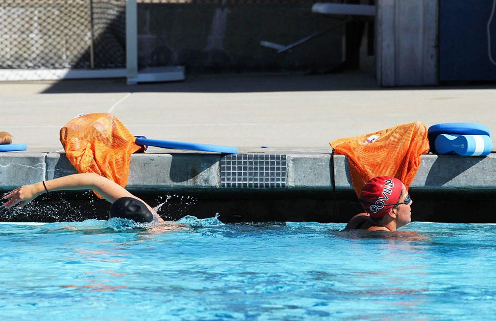 Swim team training intensifies prior to championships