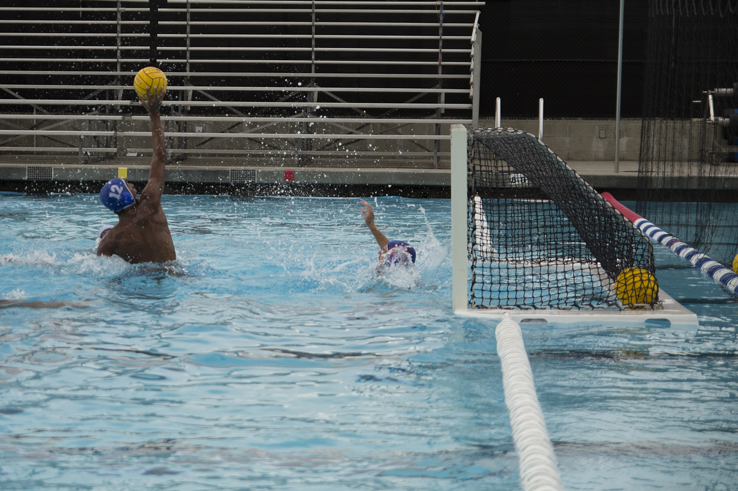 Men’s water polo moves on after double overtime loss
