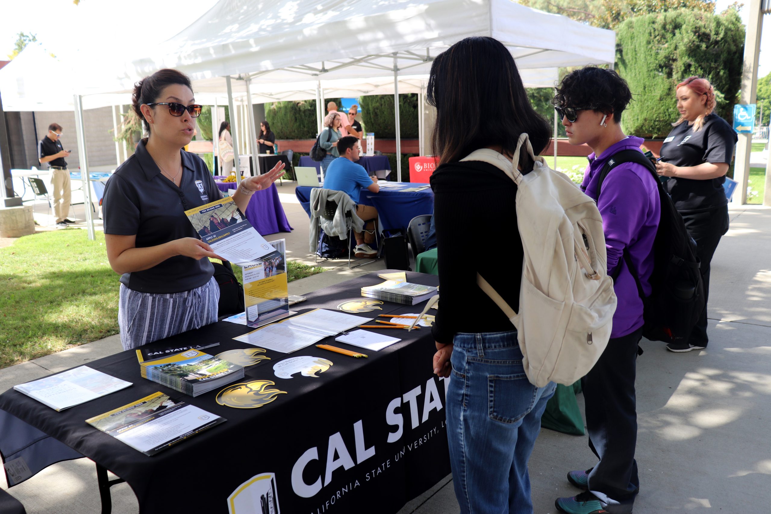 Transfer fair: Students get their questions answered by different university representatives