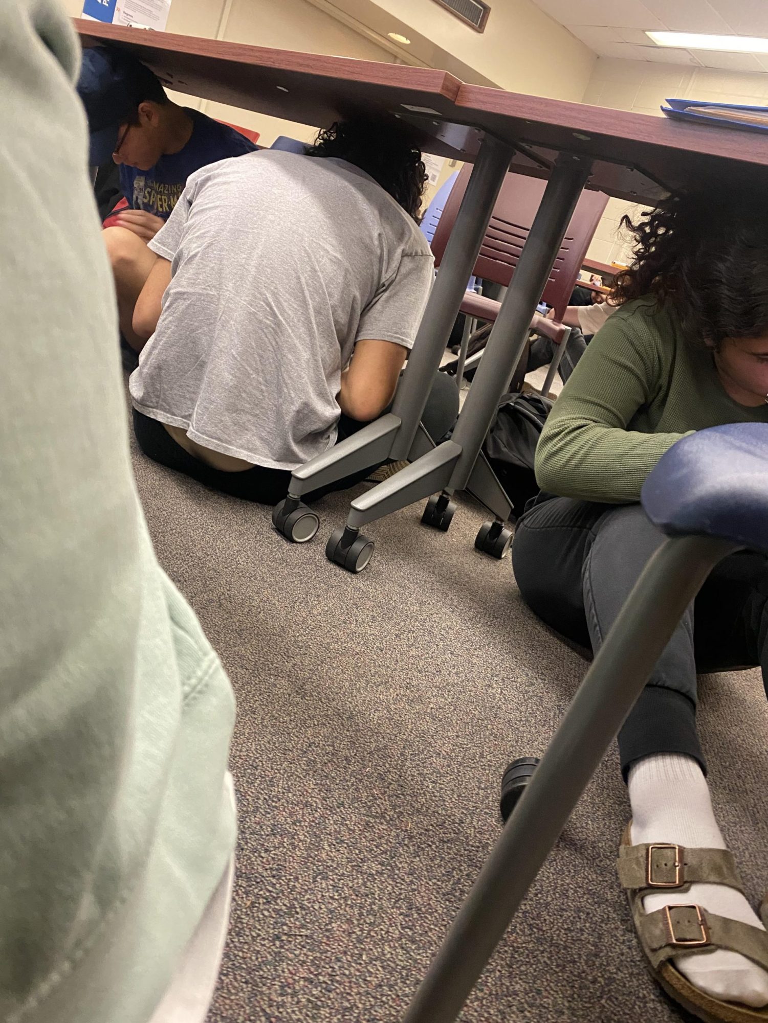 Students practice earthquake safety drill in great shakeout